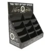Tiered cardboard counter display holding faux leather Judaica magnets